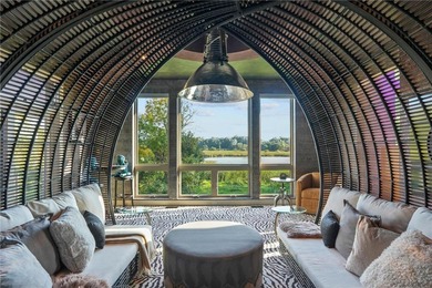 Some homes are built--others are conjured. Set upon 36 private on Begin Oaks Golf in Minnesota - for sale on GolfHomes.com, golf home, golf lot