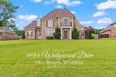 Welcome to this exquisite 3,500 sq ft residence nestled in the on Wedgewood Golfers Club in Mississippi - for sale on GolfHomes.com, golf home, golf lot