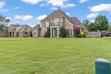 Welcome to this exquisite 3,500 sq ft residence nestled in the on Wedgewood Golfers Club in Mississippi - for sale on GolfHomes.com, golf home, golf lot