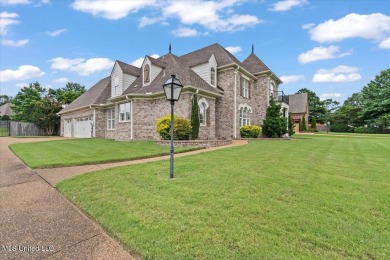Welcome to this exquisite 3,500 sq ft residence nestled in the on Wedgewood Golfers Club in Mississippi - for sale on GolfHomes.com, golf home, golf lot