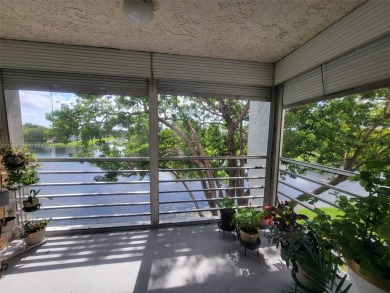 From the moment you open the door, you have an amazing lake view on Pine Island Ridge Country Club in Florida - for sale on GolfHomes.com, golf home, golf lot