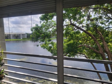 From the moment you open the door, you have an amazing lake view on Pine Island Ridge Country Club in Florida - for sale on GolfHomes.com, golf home, golf lot