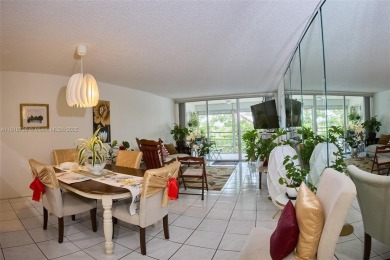 From the moment you open the door, you have an amazing lake view on Pine Island Ridge Country Club in Florida - for sale on GolfHomes.com, golf home, golf lot