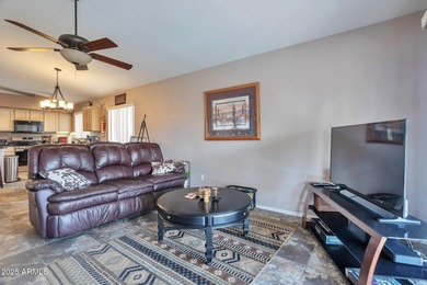 Nestled in a vibrant, active community with scenic golf courses on Coyote Lakes Golf Club in Arizona - for sale on GolfHomes.com, golf home, golf lot