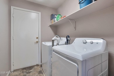 Nestled in a vibrant, active community with scenic golf courses on Coyote Lakes Golf Club in Arizona - for sale on GolfHomes.com, golf home, golf lot