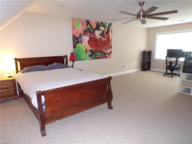 Discover the perfect blend of country, open-air, and modern on Forest Oaks Country Club in North Carolina - for sale on GolfHomes.com, golf home, golf lot