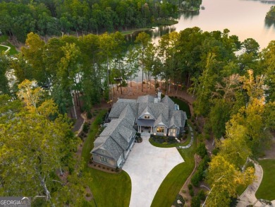 Escape to a private, peaceful lakefront sanctuary in Reynolds on Reynolds Lake Oconee - The Oconee in Georgia - for sale on GolfHomes.com, golf home, golf lot