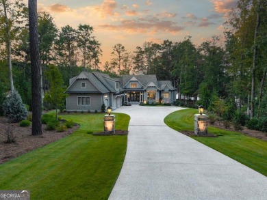 Escape to a private, peaceful lakefront sanctuary in Reynolds on Reynolds Lake Oconee - The Oconee in Georgia - for sale on GolfHomes.com, golf home, golf lot