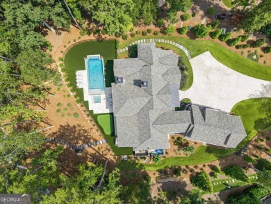 Escape to a private, peaceful lakefront sanctuary in Reynolds on Reynolds Lake Oconee - The Oconee in Georgia - for sale on GolfHomes.com, golf home, golf lot