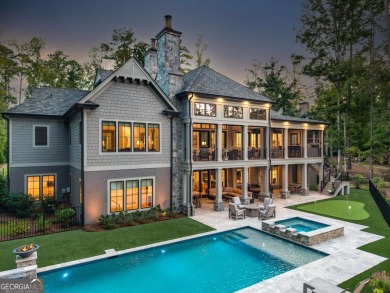 Escape to a private, peaceful lakefront sanctuary in Reynolds on Reynolds Lake Oconee - The Oconee in Georgia - for sale on GolfHomes.com, golf home, golf lot