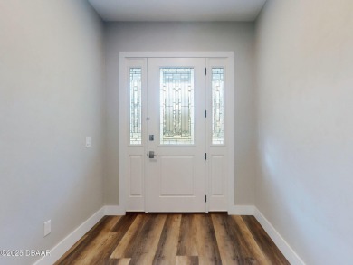 Country living meets modern convenience in this serene wooded on New Smyrna Beach Golf Course in Florida - for sale on GolfHomes.com, golf home, golf lot