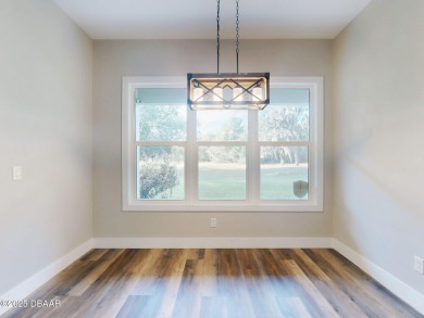 Country living meets modern convenience in this serene wooded on New Smyrna Beach Golf Course in Florida - for sale on GolfHomes.com, golf home, golf lot