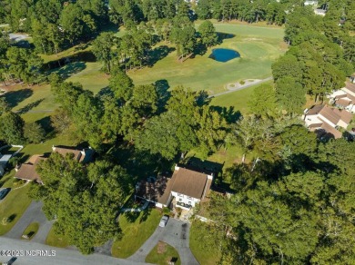 Unlock the potential of homeownership with this 2-bedroom, 2 on River Bend Golf and Country Club in North Carolina - for sale on GolfHomes.com, golf home, golf lot