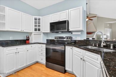 Discover easy coastal living in this beautifully updated on Members Club At St. James Plantation in North Carolina - for sale on GolfHomes.com, golf home, golf lot