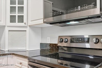 Discover easy coastal living in this beautifully updated on Members Club At St. James Plantation in North Carolina - for sale on GolfHomes.com, golf home, golf lot