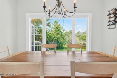 Discover easy coastal living in this beautifully updated on Members Club At St. James Plantation in North Carolina - for sale on GolfHomes.com, golf home, golf lot