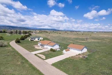 Fabulous location, location, location across from Hollydot Golf on Hollydot Golf Course in Colorado - for sale on GolfHomes.com, golf home, golf lot