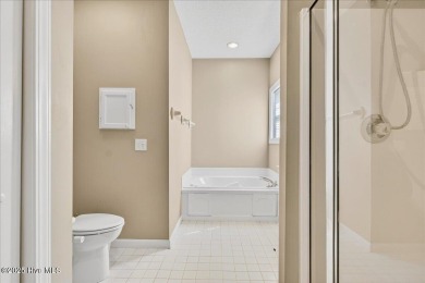 Discover easy coastal living in this beautifully updated on Members Club At St. James Plantation in North Carolina - for sale on GolfHomes.com, golf home, golf lot