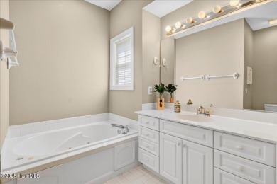 Discover easy coastal living in this beautifully updated on Members Club At St. James Plantation in North Carolina - for sale on GolfHomes.com, golf home, golf lot