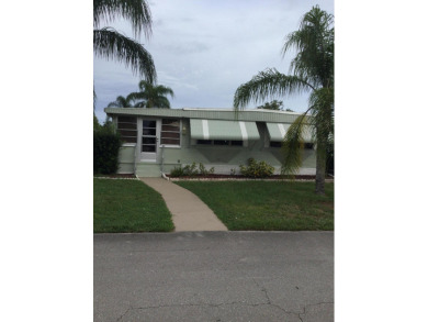 This meticulously maintained and rare three bedroom, with office on Spanish Lakes I in Florida - for sale on GolfHomes.com, golf home, golf lot