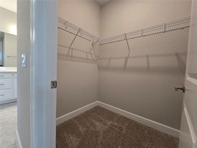 WATERFRONT HOME! Like New MAGARI MODEL HOME, including upgraded on Stonegate Golf Club in Florida - for sale on GolfHomes.com, golf home, golf lot