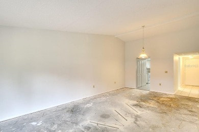 FIXER UPPER. Freshly painted and all carpet removed, it's now on Bradenton Country Club in Florida - for sale on GolfHomes.com, golf home, golf lot