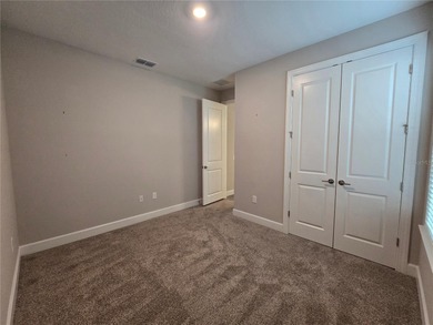 WATERFRONT HOME! Like New MAGARI MODEL HOME, including upgraded on Stonegate Golf Club in Florida - for sale on GolfHomes.com, golf home, golf lot