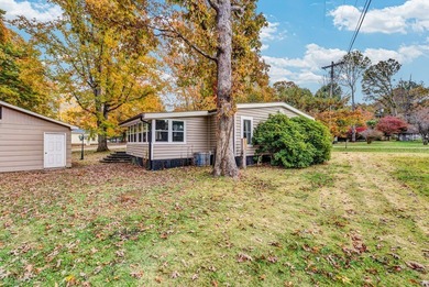 This well maintained 3-bedroom, 2-bath manufactured home offers on Stonehenge Golf Course in Tennessee - for sale on GolfHomes.com, golf home, golf lot