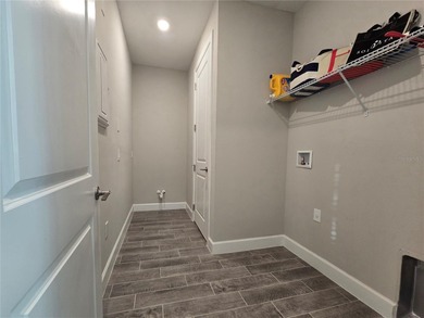 WATERFRONT HOME! Like New MAGARI MODEL HOME, including upgraded on Stonegate Golf Club in Florida - for sale on GolfHomes.com, golf home, golf lot