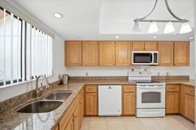 Live the golf course lifestyle! This stunning 3BR/2.5BA townhome on The Grand Club - Pine Lakes Course in Florida - for sale on GolfHomes.com, golf home, golf lot