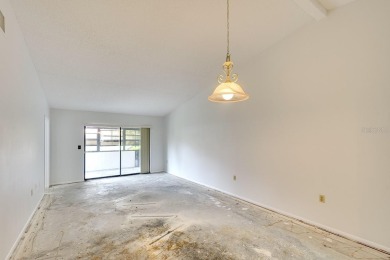 FIXER UPPER. Freshly painted and all carpet removed, it's now on Bradenton Country Club in Florida - for sale on GolfHomes.com, golf home, golf lot