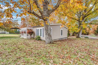 This well maintained 3-bedroom, 2-bath manufactured home offers on Stonehenge Golf Course in Tennessee - for sale on GolfHomes.com, golf home, golf lot