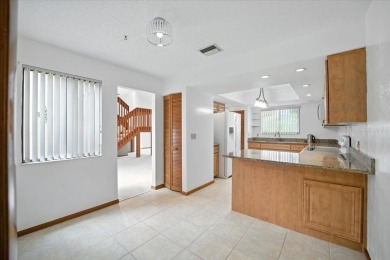 Live the golf course lifestyle! This stunning 3BR/2.5BA townhome on The Grand Club - Pine Lakes Course in Florida - for sale on GolfHomes.com, golf home, golf lot
