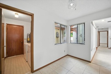 Live the golf course lifestyle! This stunning 3BR/2.5BA townhome on The Grand Club - Pine Lakes Course in Florida - for sale on GolfHomes.com, golf home, golf lot