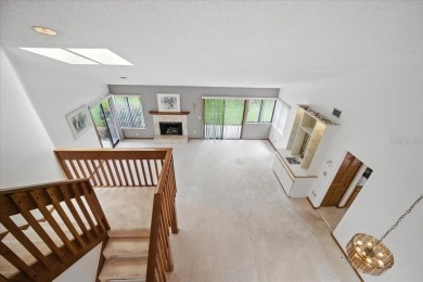 Live the golf course lifestyle! This stunning 3BR/2.5BA townhome on The Grand Club - Pine Lakes Course in Florida - for sale on GolfHomes.com, golf home, golf lot