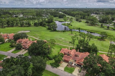 Live the golf course lifestyle! This stunning 3BR/2.5BA townhome on The Grand Club - Pine Lakes Course in Florida - for sale on GolfHomes.com, golf home, golf lot