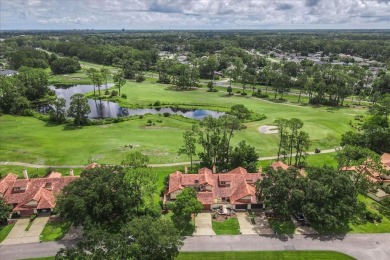 Live the golf course lifestyle! This stunning 3BR/2.5BA townhome on The Grand Club - Pine Lakes Course in Florida - for sale on GolfHomes.com, golf home, golf lot