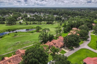 Live the golf course lifestyle! This stunning 3BR/2.5BA townhome on The Grand Club - Pine Lakes Course in Florida - for sale on GolfHomes.com, golf home, golf lot