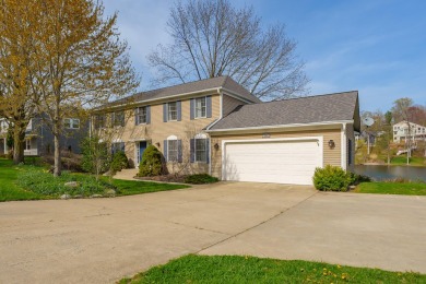 Welcome to a wonderful, classic 2-story home with a walk out on Lake Doster Golf Club in Michigan - for sale on GolfHomes.com, golf home, golf lot