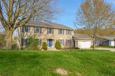 Welcome to a wonderful, classic 2-story home with a walk out on Lake Doster Golf Club in Michigan - for sale on GolfHomes.com, golf home, golf lot