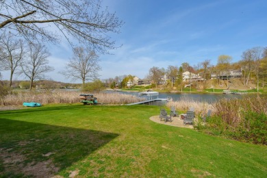 Welcome to a wonderful, classic 2-story home with a walk out on Lake Doster Golf Club in Michigan - for sale on GolfHomes.com, golf home, golf lot