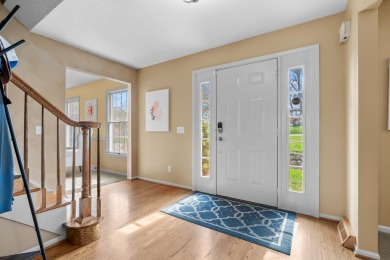 Welcome to a wonderful, classic 2-story home with a walk out on Lake Doster Golf Club in Michigan - for sale on GolfHomes.com, golf home, golf lot