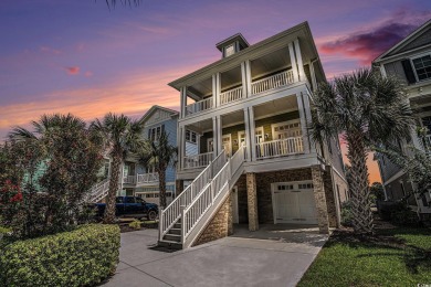 A stunning home situated directly on the Intracoastal Waterway on Myrtlewood Golf Course and Club  in South Carolina - for sale on GolfHomes.com, golf home, golf lot
