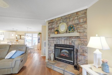 Are you in search of a furnished three bedroom home with extra on Maple Leaf Golf and Country Club in Florida - for sale on GolfHomes.com, golf home, golf lot