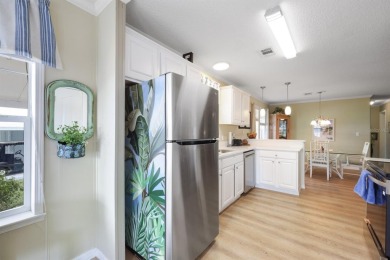 Are you in search of a furnished three bedroom home with extra on Maple Leaf Golf and Country Club in Florida - for sale on GolfHomes.com, golf home, golf lot