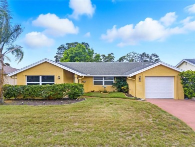 Lovely and spacious, this 2-bedroom, 2-bathroom home with a on Beacon Woods Golf Club in Florida - for sale on GolfHomes.com, golf home, golf lot