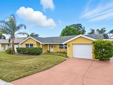 Lovely and spacious, this 2-bedroom, 2-bathroom home with a on Beacon Woods Golf Club in Florida - for sale on GolfHomes.com, golf home, golf lot
