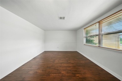Lovely and spacious, this 2-bedroom, 2-bathroom home with a on Beacon Woods Golf Club in Florida - for sale on GolfHomes.com, golf home, golf lot