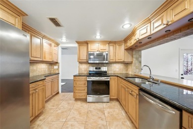 Lovely and spacious, this 2-bedroom, 2-bathroom home with a on Beacon Woods Golf Club in Florida - for sale on GolfHomes.com, golf home, golf lot