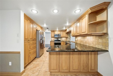 Lovely and spacious, this 2-bedroom, 2-bathroom home with a on Beacon Woods Golf Club in Florida - for sale on GolfHomes.com, golf home, golf lot